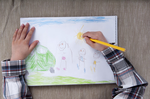 child doing a drawing