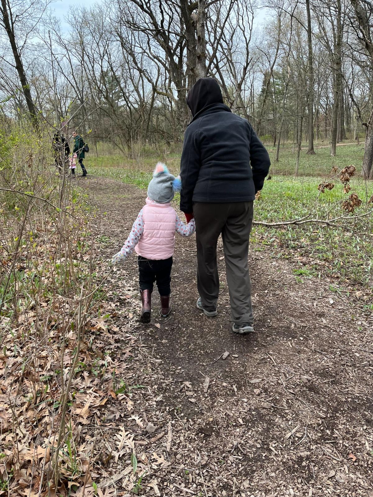 adult and child hiking