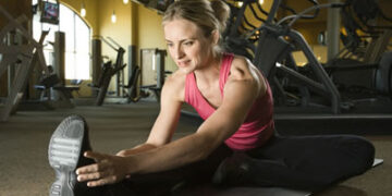 woman does stretching exercises