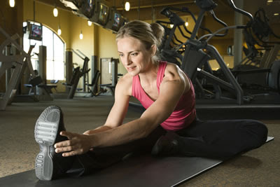 woman does stretching exercises